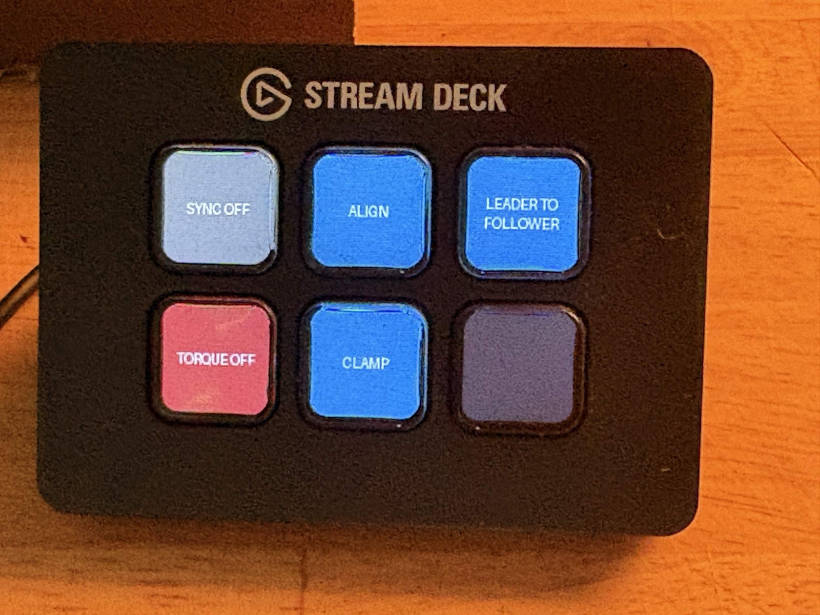 The real thing: five buttons doing robot duty.